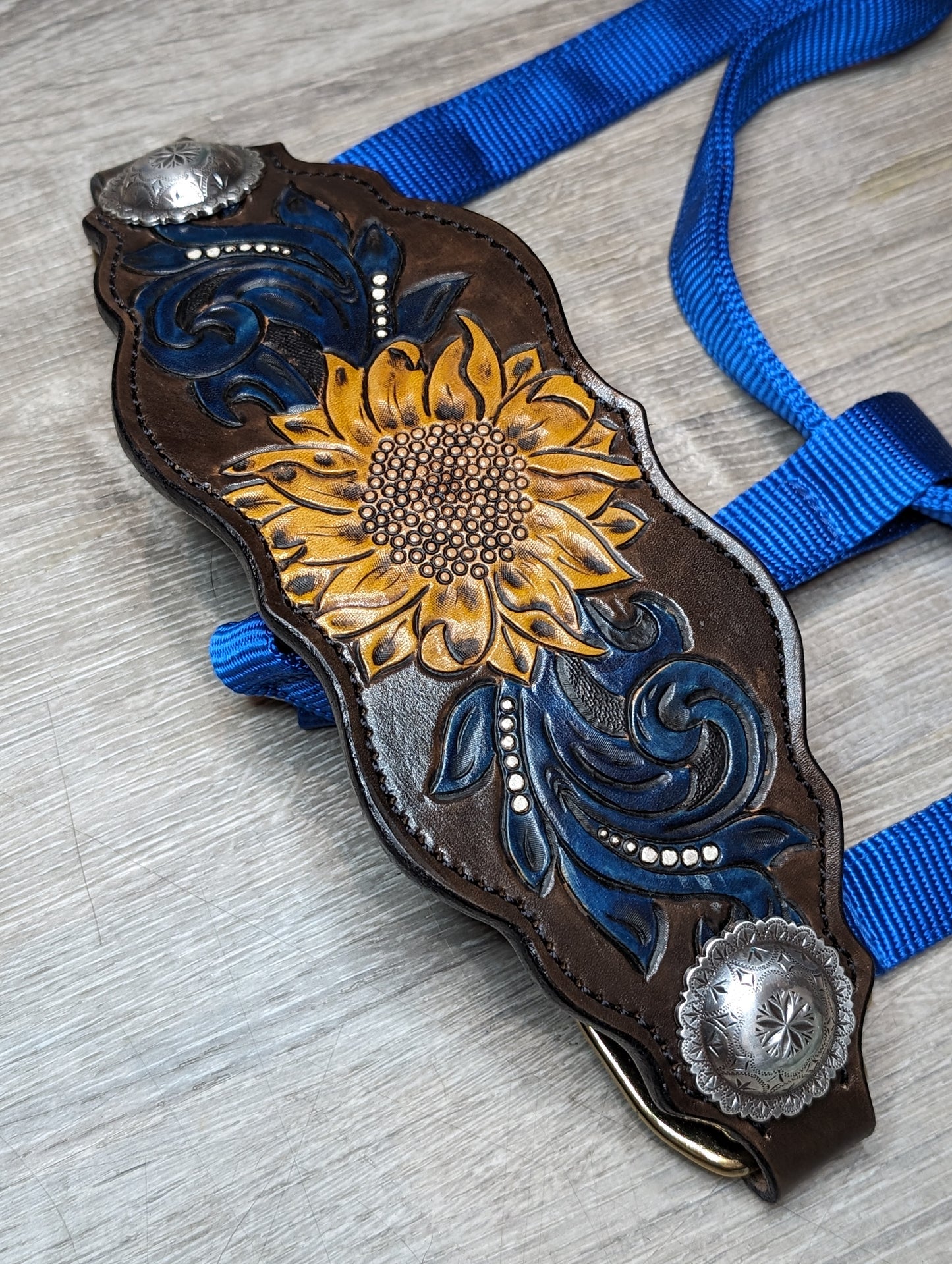 Sunflower and swirl tooled noseband on Royal Blue Nylon Halter