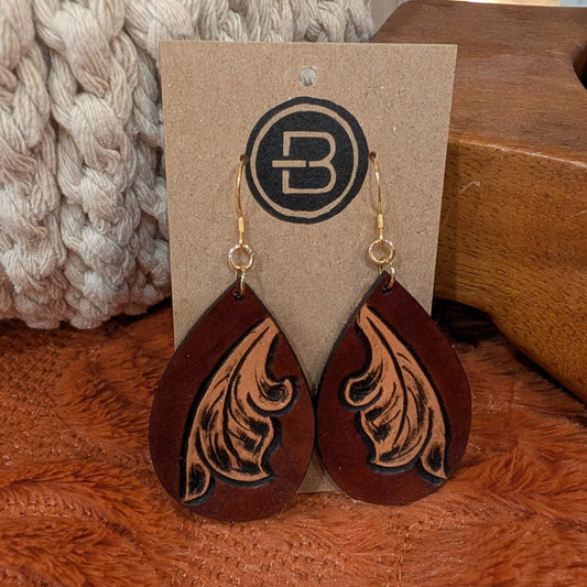 brown western scroll earrings on branded display card