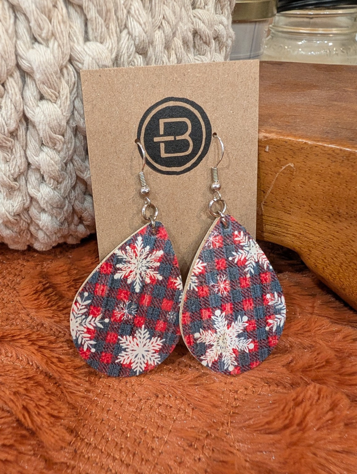 Red and navy plaid snowflake teardrop earrings with silver-tone hooks